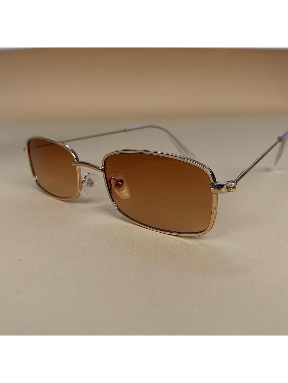 Brown and gold slim sunglasses. Brown trim with brown lenses. Glasses are - Picture 1 of 6